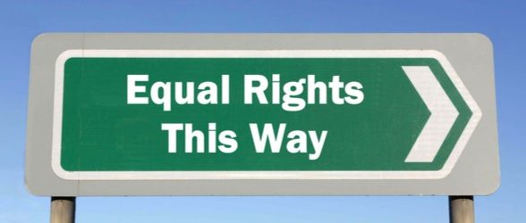 Green Road Sign against a blue sky that says "Equal Rights This Way"