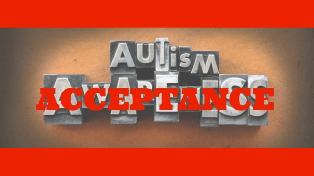 The words Autism Awareness made from vintage lead letterpress type. Over the word "awareness" is the word "acceptance" in bold red letters.