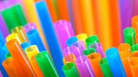 Multicolored plastic drinking straws.