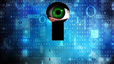 Blue background with computer data. In the middle is a keyhole with a green eye staring directly through.
