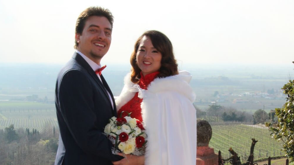 A wedding photo of the author and her husband.