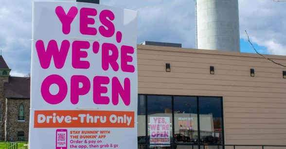 Sign that says "Yes we're open, Drive Thru Only"