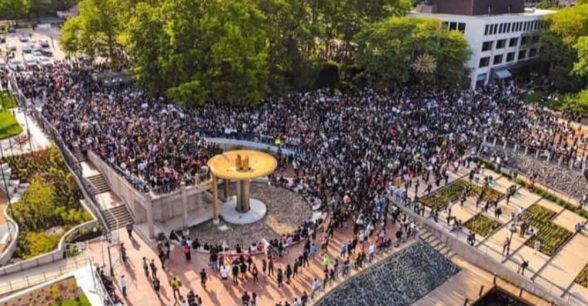 An overhead view of a crowd gathered for a protest