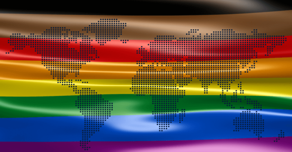 A BIPOC-inclusive pride flag with a map of the world on top of it.