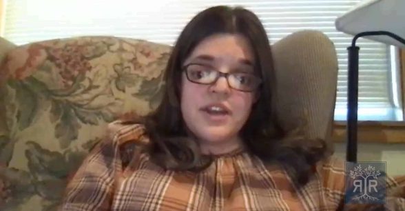 A screenshot of Ariel speaking to camera through a video chat.