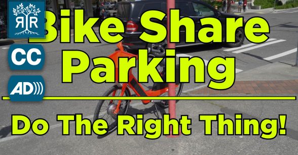 Image of a busy street. A car is in the right lane and a bike is resting against a pole on the sidewalk. The following words appear in yellow font: Bike Share Parking: Do The Right Thing